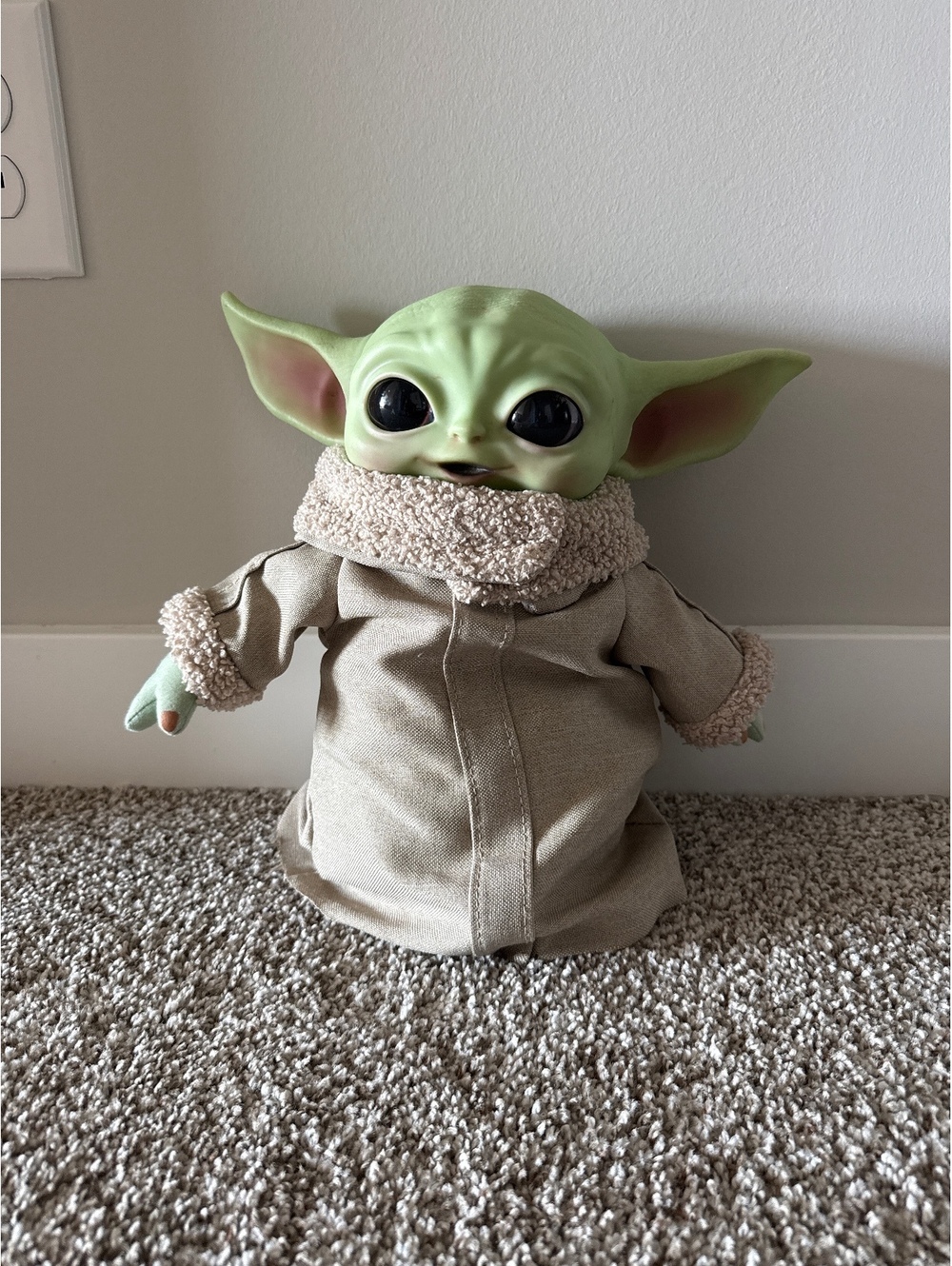 Grogu figure with soft beaded body